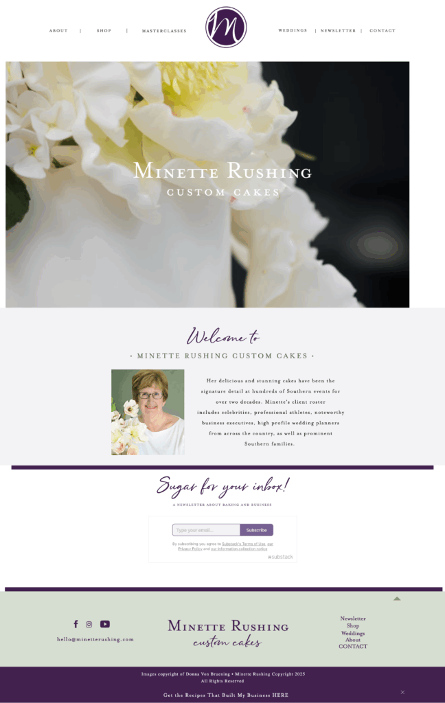 Screenshot of a refreshed bakery website homepage for luxury cake designer Minette Rushing, featuring a close-up of a white flower, business name, and menu links for about, shop, weddings, and contact.