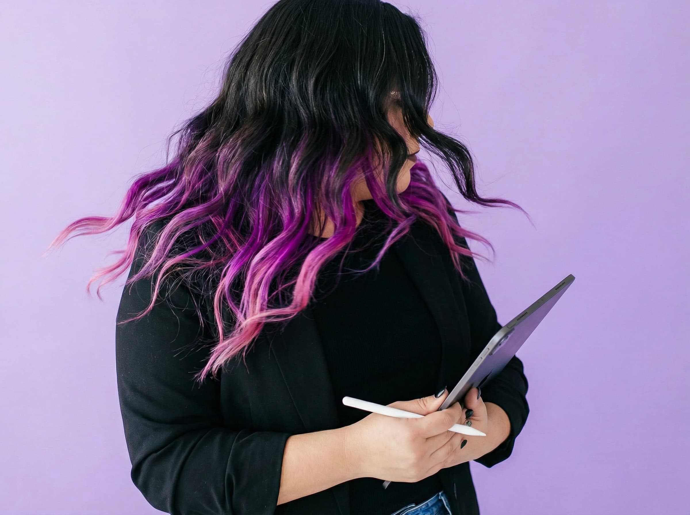 Ingrid working through a plan on a tablet